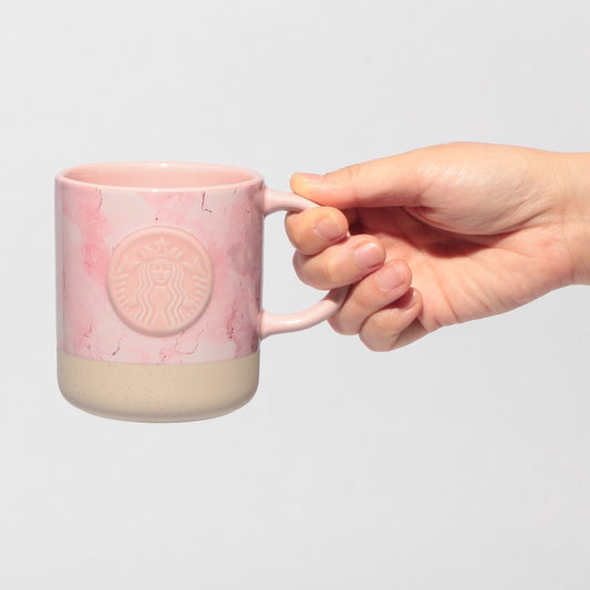 Starbucks Japan SAKURA Shine Brightly 2026 collection merchandise. Limited edition series featuring glitter pink stainless bottles, Stanley collaboration tumblers in pink gradient, and color-changing cups. The design theme highlights vivid spring colors, metallic gold accents, and bright cherry blossom patterns.