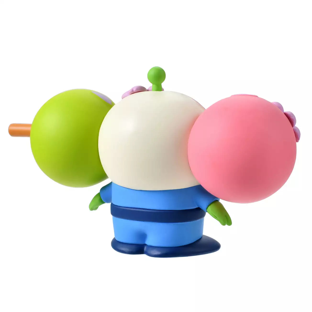 A funny and creative figure of a Little Green Man (Alien) reimagined as a 'Hanami Dango' skewer. The Alien's head is the center green dumpling, sandwiched between a pink dumpling on the left and a lime green dumpling on the right. The character wears a blue space suit body below the dango head. Pink flower petals decorate the dumplings.