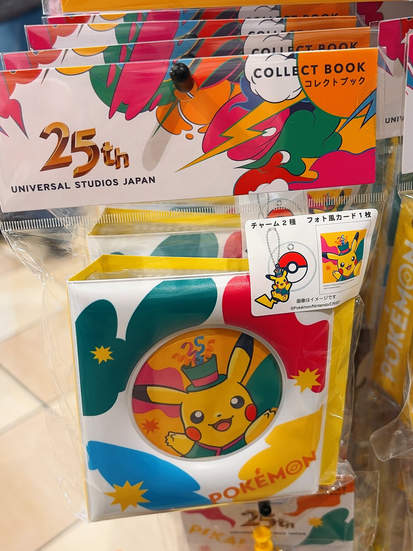 A limited-edition collect book from the exclusive Universal Studios Japan 25th Anniversary Pokémon 'Discover U!!!' collection, featuring festive celebratory designs.