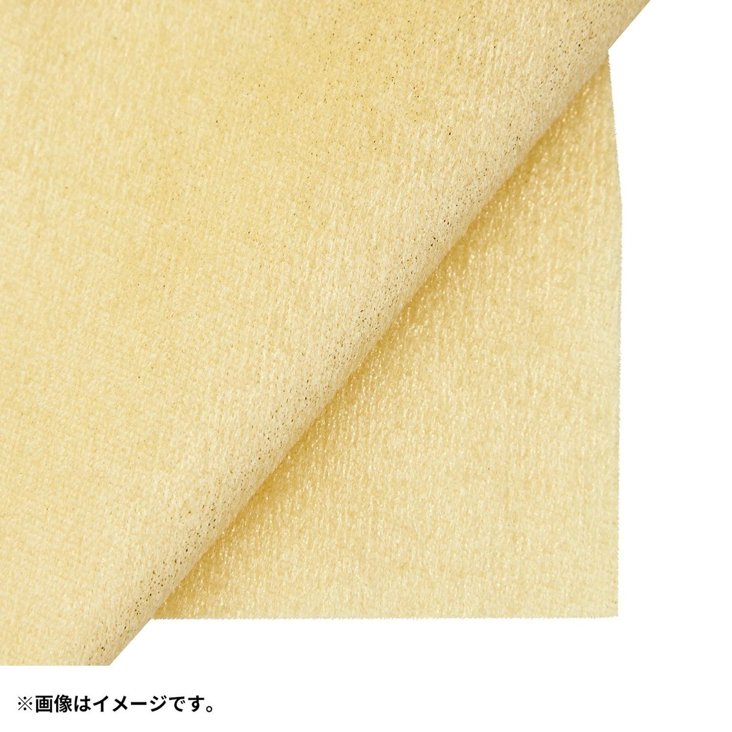 Close-up of the exclusive Pokémon 30th Anniversary Pikachu plush, showing the special golden 'Since 1996' woven tag and delicate glitter fabric.