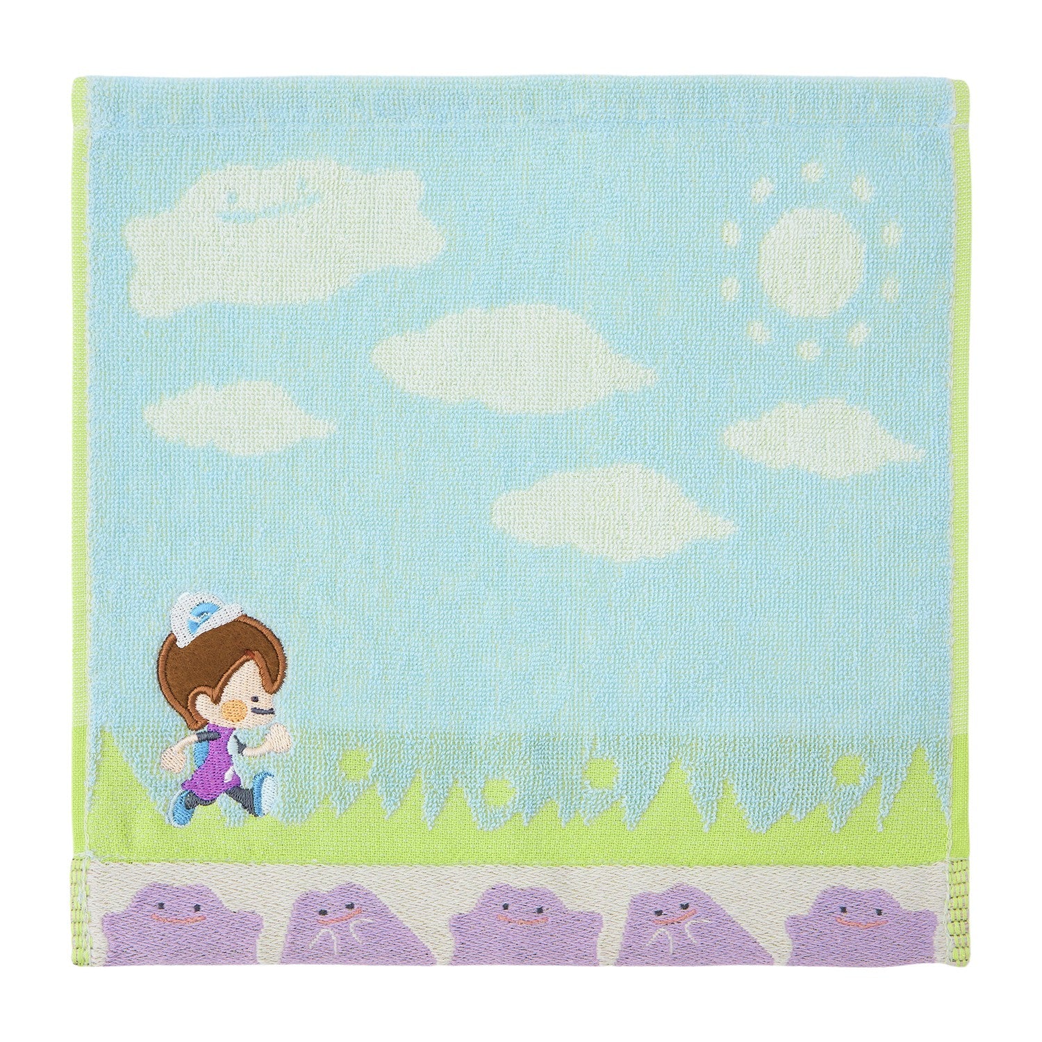 A soft everyday hand towel featuring the blue design of the human-form Ditto protagonist from Pokémon Pokopia.