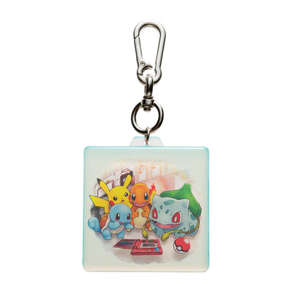 Collectible acrylic keychain featuring retro Kanto region artwork from the Pokémon Timeless Adventure collection.