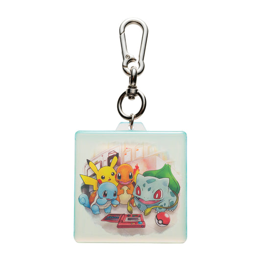 Collectible acrylic keychain featuring retro Kanto region artwork from the Pokémon Timeless Adventure collection.