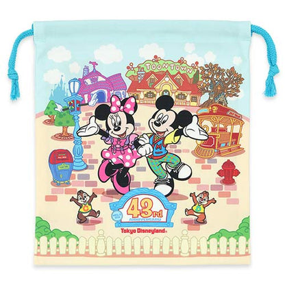 Tokyo Disneyland 43rd Anniversary Toontown drawstring pouch featuring colorful Disney character art.