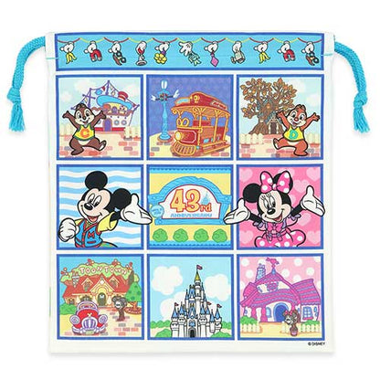 Tokyo Disneyland 43rd Anniversary Toontown drawstring pouch featuring colorful Disney character art.