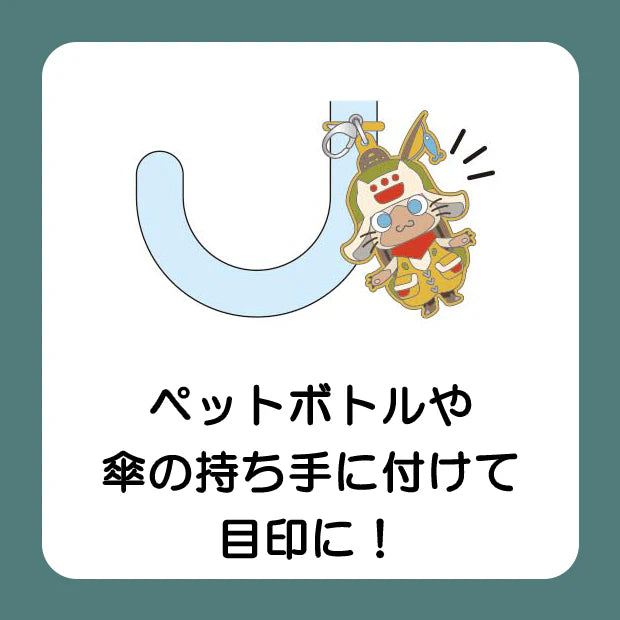A USJ exclusive Monster Hunter secret collectible charm collection. The image displays a lineup of nine different Palico Felyne characters dressed in various colorful armor sets and outfits, along with one black circle featuring a question mark to represent the rare 'secret' mystery design. There are 10 designs in total to collect in this blind box series.