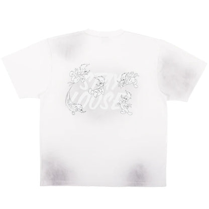 A white oversized t-shirt from the USJ UNIVRS collection featuring a tie-dye effect and a small graphic of Woody Woodpecker laughing with the text 'WOODY WOODPECKER'.