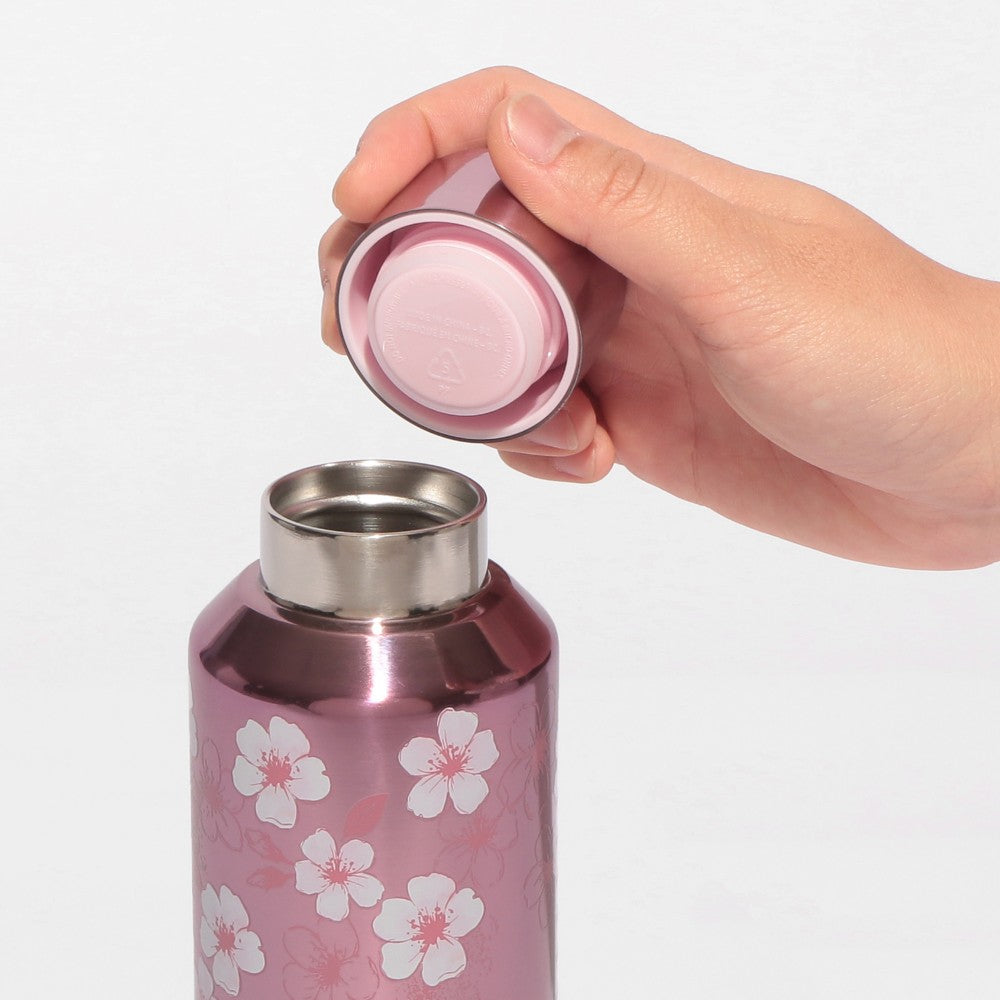 Starbucks Japan SAKURA Shine Brightly 2026 collection merchandise. Limited edition series featuring glitter pink stainless bottles, Stanley collaboration tumblers in pink gradient, and color-changing cups. The design theme highlights vivid spring colors, metallic gold accents, and bright cherry blossom patterns.