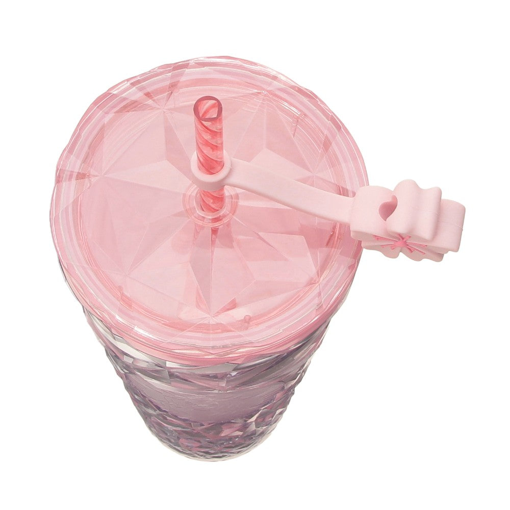 Starbucks Japan SAKURA Shine Brightly 2026 collection merchandise. Limited edition series featuring glitter pink stainless bottles, Stanley collaboration tumblers in pink gradient, and color-changing cups. The design theme highlights vivid spring colors, metallic gold accents, and bright cherry blossom patterns.