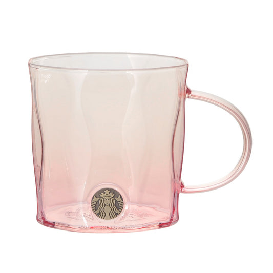Starbucks Japan SAKURA Shine Brightly 2026 collection merchandise. Limited edition series featuring glitter pink stainless bottles, Stanley collaboration tumblers in pink gradient, and color-changing cups. The design theme highlights vivid spring colors, metallic gold accents, and bright cherry blossom patterns.