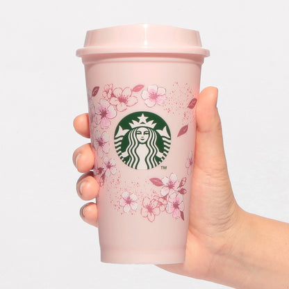 Starbucks Japan SAKURA Shine Brightly 2026 collection merchandise. Limited edition series featuring glitter pink stainless bottles, Stanley collaboration tumblers in pink gradient, and color-changing cups. The design theme highlights vivid spring colors, metallic gold accents, and bright cherry blossom patterns.
