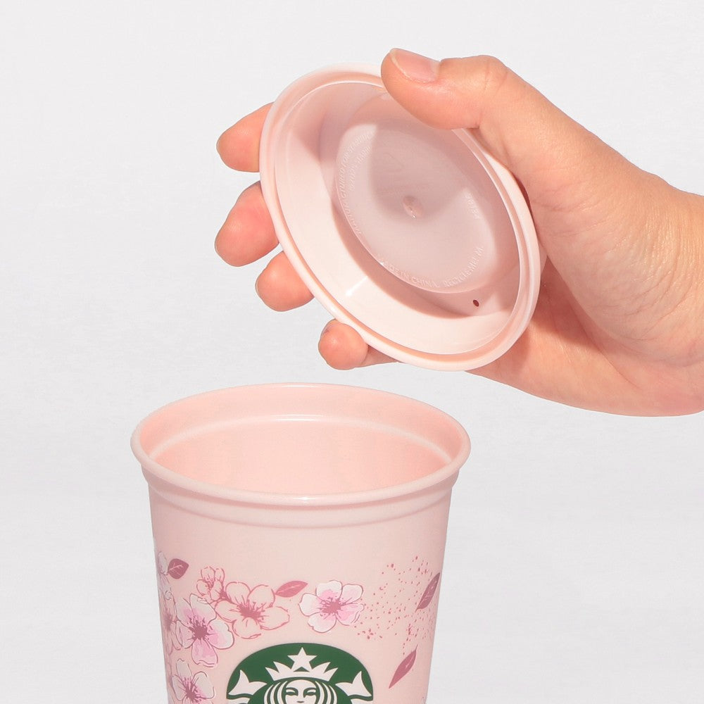 Starbucks Japan SAKURA Shine Brightly 2026 collection merchandise. Limited edition series featuring glitter pink stainless bottles, Stanley collaboration tumblers in pink gradient, and color-changing cups. The design theme highlights vivid spring colors, metallic gold accents, and bright cherry blossom patterns.