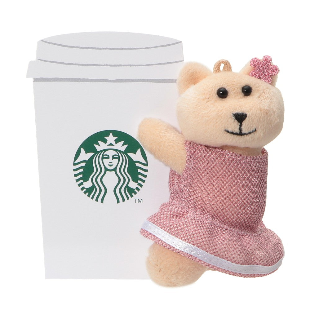 Starbucks Japan SAKURA Shine Brightly 2026 collection merchandise. Limited edition series featuring glitter pink stainless bottles, Stanley collaboration tumblers in pink gradient, and color-changing cups. The design theme highlights vivid spring colors, metallic gold accents, and bright cherry blossom patterns.